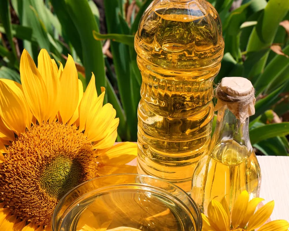 Sunflower oil bottles with sunflowers